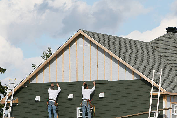 Professional Emergency Siding Repair technician working in Lancaster, TX